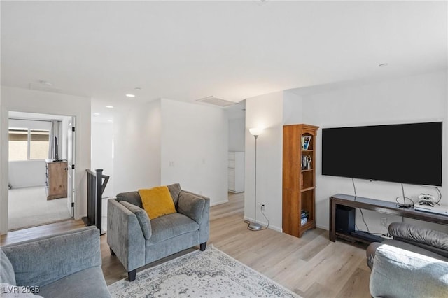 10376 Sadie Blake Ave, Las Vegas, NV 89166 - living room with light wood-type flooring, baseboards, and recessed lighting