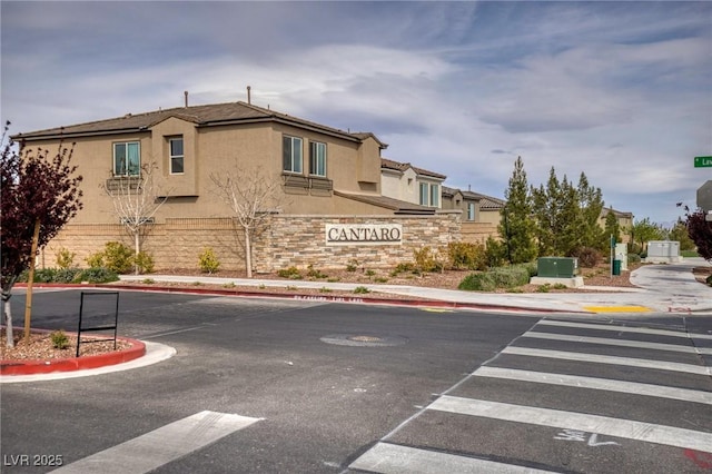 10376 Sadie Blake Ave, Las Vegas, NV 89166 - view of asphalt street featuring curbs and sidewalks