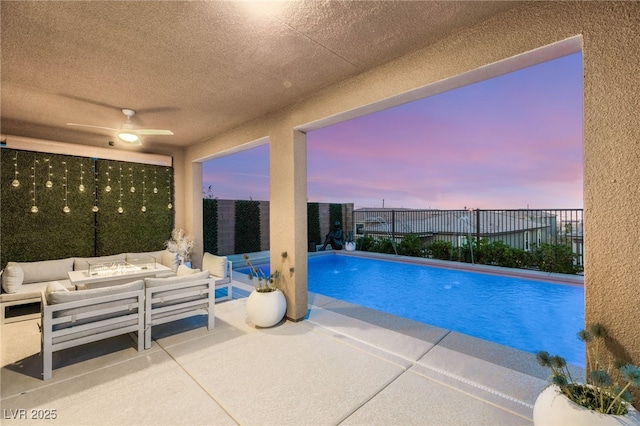 390 Coastal Redwood St, Las Vegas, NV 89138 - view of pool with an outdoor living space with a fire pit, a ceiling fan, a patio area, and fence