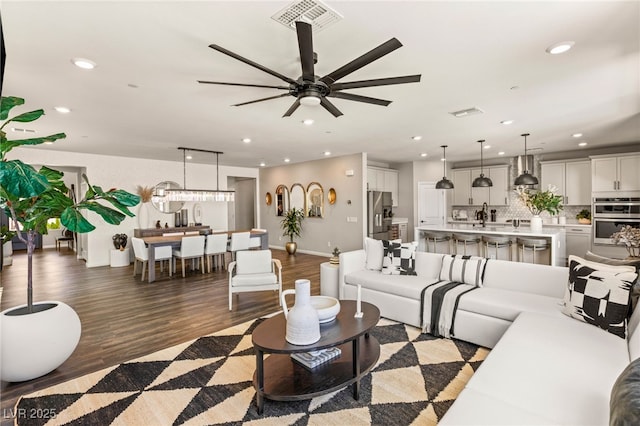 390 Coastal Redwood St, Las Vegas, NV 89138 - living room with a ceiling fan, wood finished floors, recessed lighting, and baseboards