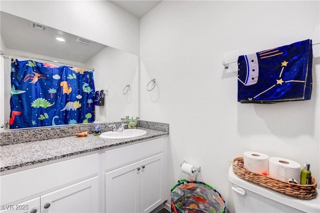 1125 Meadow Sparrow Pl, Henderson, NV 89011 - full bath with vanity, toilet, and curtained shower