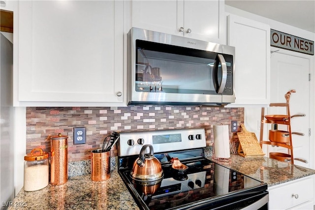 1125 Meadow Sparrow Pl, Henderson, NV 89011 - kitchen with stainless steel appliances, white cabinetry, backsplash, and stone counters