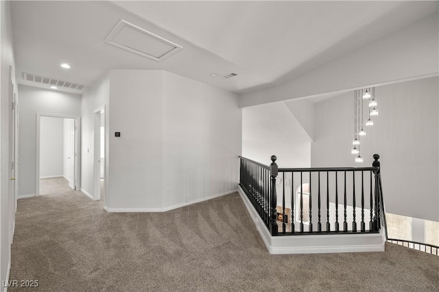 4607 El Camino Cabos Dr, Las Vegas, NV 89147 - hallway featuring carpet flooring, an upstairs landing, recessed lighting, attic access, and baseboards