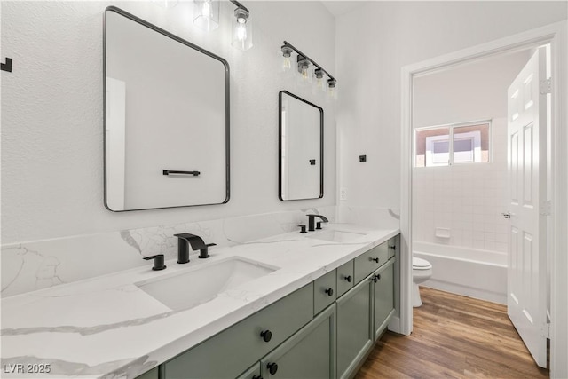 4607 El Camino Cabos Dr, Las Vegas, NV 89147 - full bath with toilet, wood finished floors, and double vanity