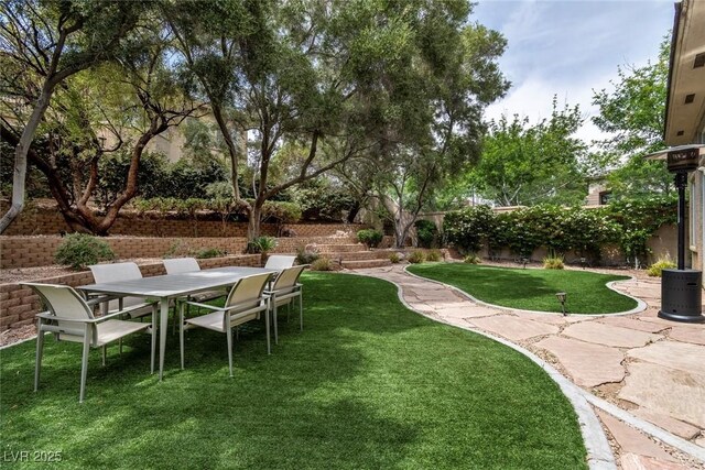 801 Aquitaine Ct, Las Vegas, NV 89145 - view of yard with outdoor dining area and a patio area
