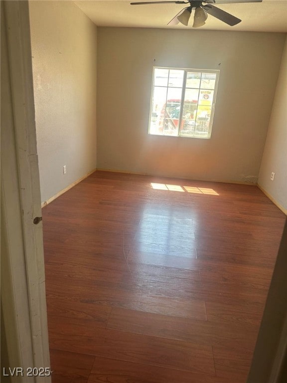 4356 Sabadell St, Las Vegas, NV 89121 - empty room with ceiling fan and wood finished floors