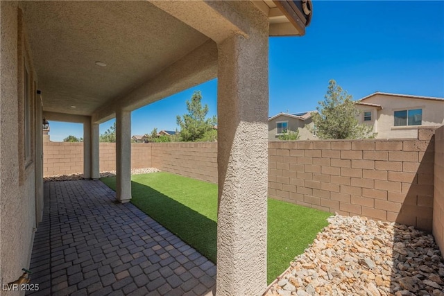 view of patio with a fenced backyard