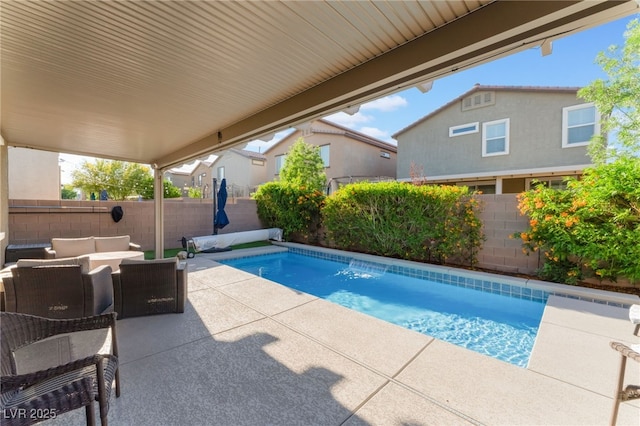 4524 Stardusk Falls Ave, North Las Vegas, NV 89084 - view of swimming pool with an outdoor living space, a patio, and a fenced backyard