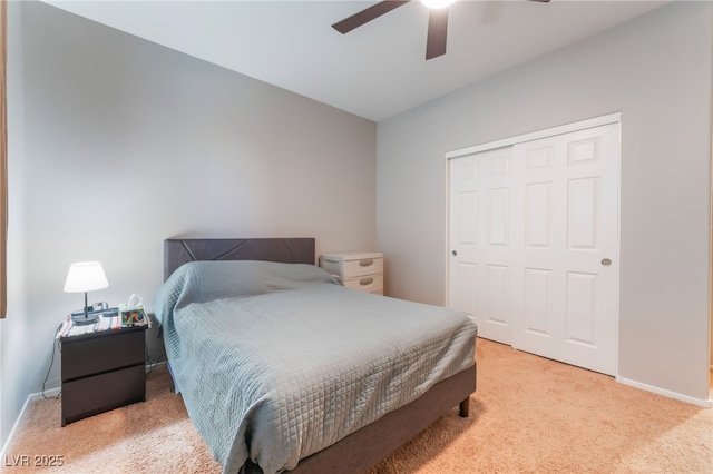4524 Stardusk Falls Ave, North Las Vegas, NV 89084 - bedroom with light colored carpet, a closet, baseboards, and ceiling fan