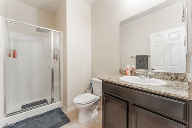 4524 Stardusk Falls Ave, North Las Vegas, NV 89084 - bathroom with a shower stall, vanity, toilet, and tile patterned floors