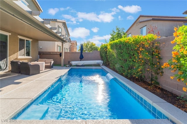 4524 Stardusk Falls Ave, North Las Vegas, NV 89084 - view of pool featuring a fenced backyard, an outdoor living space, and a patio area
