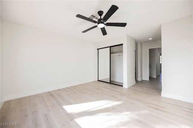 4669 Winfield Dr, Las Vegas, NV 89147 - unfurnished bedroom featuring wood finished floors, a closet, recessed lighting, and a ceiling fan