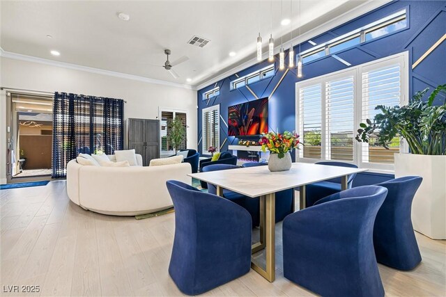 dining space with ceiling fan, wood finished floors, crown molding, and recessed lighting