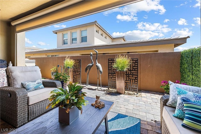 view of patio / terrace with fence