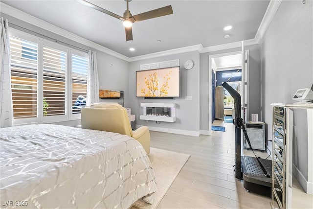 bedroom featuring ornamental molding, light wood-style floors, baseboards, recessed lighting, and a ceiling fan