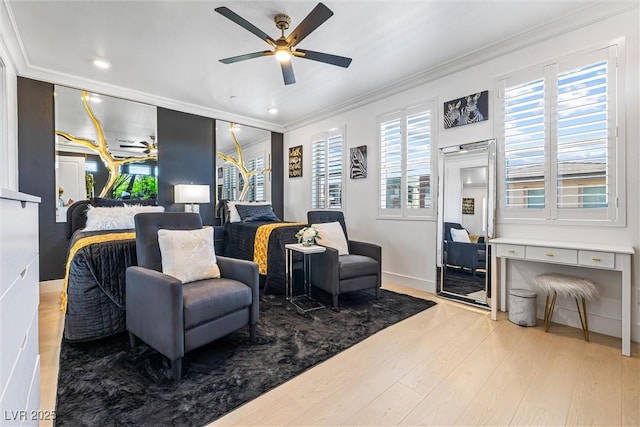 living room with ornamental molding, ceiling fan, wood finished floors, baseboards, and recessed lighting