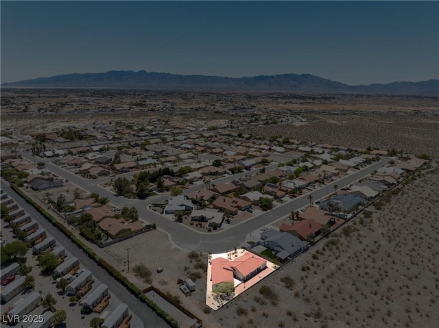 3640 E Vineyard Dr, Pahrump, NV 89048 - aerial view of residential area featuring a mountain backdrop and a desert landscape