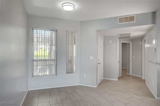 7189 S Durango Dr Unit 208, Las Vegas, NV 89113 - spare room with baseboards