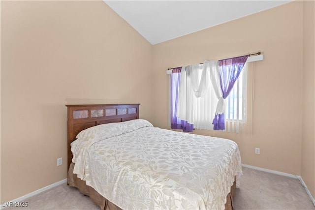 608 Blooming View Ave, North Las Vegas, NV 89032 - carpeted bedroom featuring lofted ceiling and baseboards