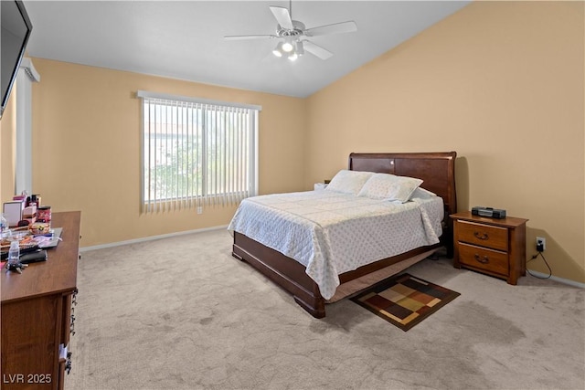 608 Blooming View Ave, North Las Vegas, NV 89032 - bedroom with light colored carpet, lofted ceiling, baseboards, and a ceiling fan