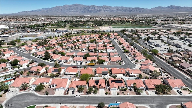 608 Blooming View Ave, North Las Vegas, NV 89032 - aerial view of property and surrounding area featuring mountains and nearby suburban area