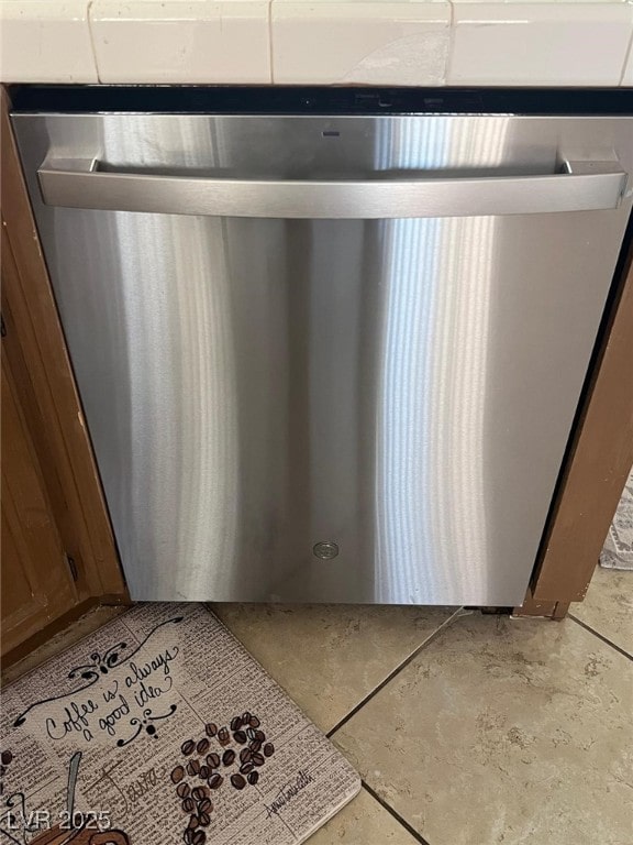 608 Blooming View Ave, North Las Vegas, NV 89032 - detailed view of stainless steel dishwasher and concrete floors