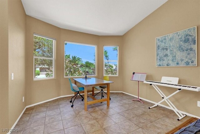office area featuring healthy amount of natural light, baseboards, and light tile patterned floors