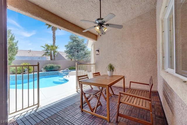 view of patio / terrace with a ceiling fan and a fenced backyard