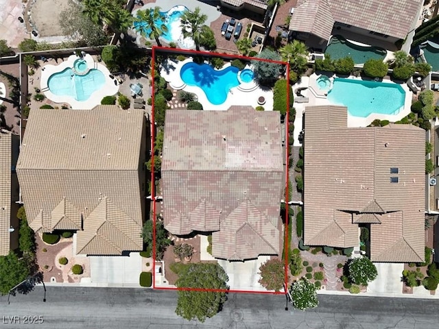 view of property location featuring a pool area and property boundaries highlighted