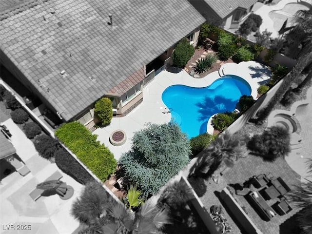 drone / aerial view of a pool