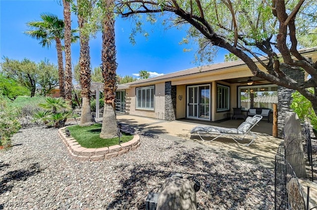 10237 Andante Ct, Las Vegas, NV 89135 - rear view of property with stucco siding, ceiling fan, and a patio