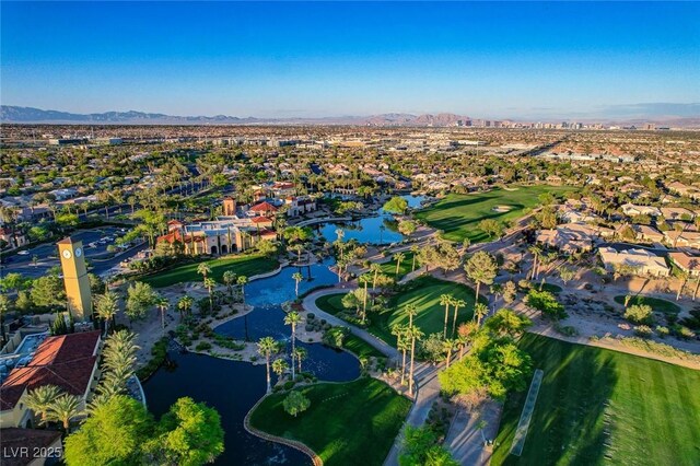 10237 Andante Ct, Las Vegas, NV 89135 - aerial perspective of suburban area with a water and mountain view and a golf club