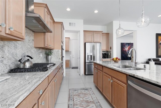 12844 New Providence St, Las Vegas, NV 89141 - kitchen with wall chimney range hood, stainless steel appliances, a sink, light stone countertops, and tasteful backsplash