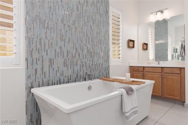 12844 New Providence St, Las Vegas, NV 89141 - full bath with vanity, plenty of natural light, a freestanding tub, and tile patterned floors