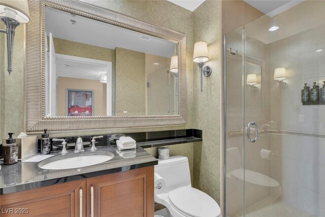 135 E Harmon Ave Unit 1102, Las Vegas, NV 89109 - bathroom with toilet, a shower stall, and vanity