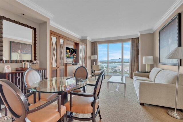 135 E Harmon Ave Unit 1102, Las Vegas, NV 89109 - dining space with crown molding and baseboards