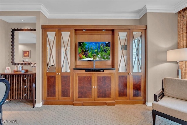135 E Harmon Ave Unit 1102, Las Vegas, NV 89109 - foyer featuring baseboards, light flooring, and ornamental molding