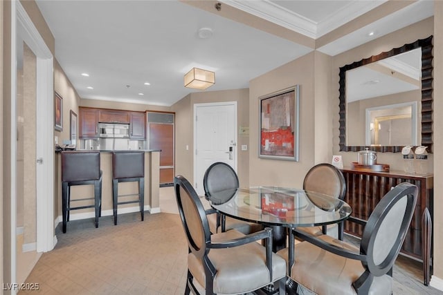135 E Harmon Ave Unit 1102, Las Vegas, NV 89109 - dining room with crown molding, baseboards, and recessed lighting