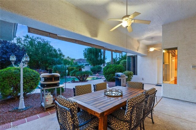 4649 Bird View Ct, Las Vegas, NV 89129 - view of patio / terrace with a ceiling fan, outdoor dining space, and grilling area