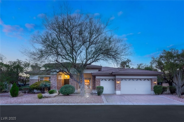 4649 Bird View Ct, Las Vegas, NV 89129 - view of front of house with brick siding, a garage, and concrete driveway