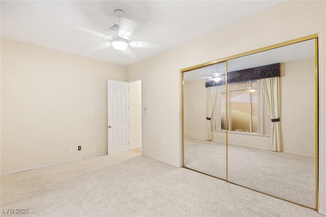 4649 Bird View Ct, Las Vegas, NV 89129 - unfurnished bedroom with a closet, carpet flooring, a ceiling fan, and baseboards