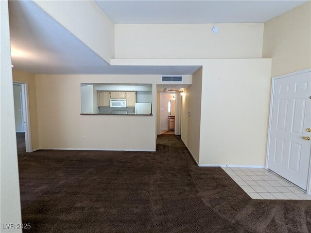 555 E Silverado Ranch Blvd Unit 2147, Las Vegas, NV 89183 - unfurnished living room featuring carpet flooring and baseboards