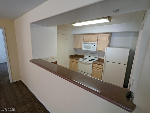 555 E Silverado Ranch Blvd Unit 2147, Las Vegas, NV 89183 - kitchen featuring white appliances, dark carpet, dark countertops, and light brown cabinets