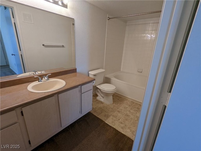 555 E Silverado Ranch Blvd Unit 2147, Las Vegas, NV 89183 - bathroom featuring toilet, vanity, and bathtub / shower combination