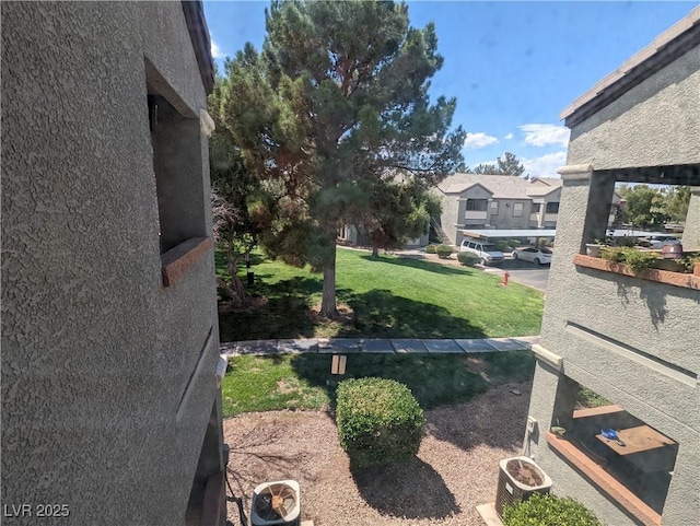 555 E Silverado Ranch Blvd Unit 2147, Las Vegas, NV 89183 - view of grassy yard with a residential view and central air condition unit