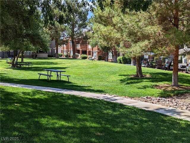 555 E Silverado Ranch Blvd Unit 2147, Las Vegas, NV 89183 - view of property's community featuring a lawn