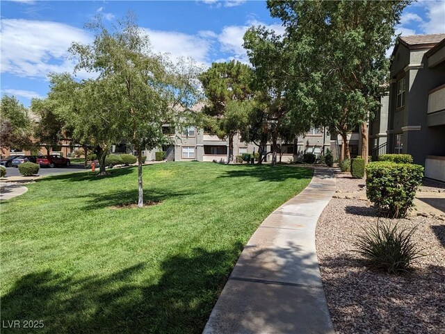 555 E Silverado Ranch Blvd Unit 2147, Las Vegas, NV 89183 - view of home's community with a yard