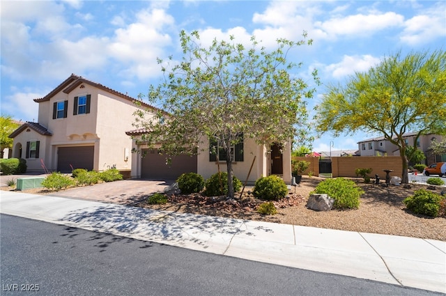 184 Cullerton St, Las Vegas, NV 89148 - view of front facade with stucco siding, driveway, fence, and a tile roof