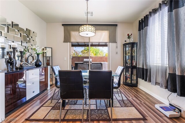 184 Cullerton St, Las Vegas, NV 89148 - dining area with wood finished floors and baseboards