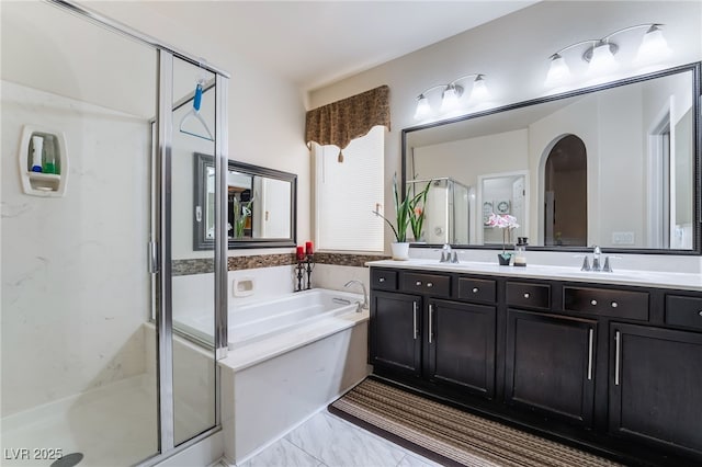 184 Cullerton St, Las Vegas, NV 89148 - bathroom with a stall shower, a garden tub, double vanity, and marble finish floors